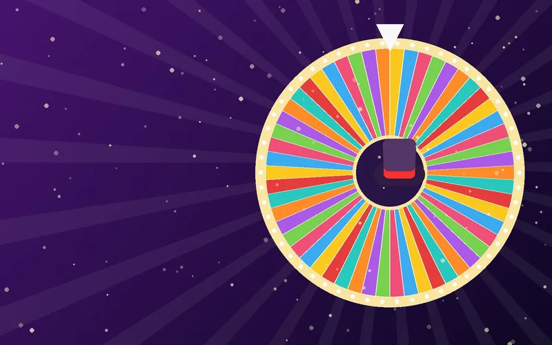A colourful money wheel with a top hat in the centre